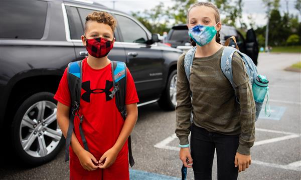 students smile on first day of school